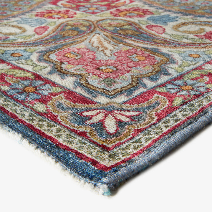 Exquisite traditional rug with intricate patterns and vibrant colors showcased.