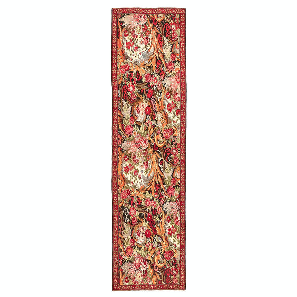 Intricate floral and botanical Persian rug with vibrant colors.