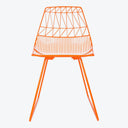 Vibrant orange wire-frame chair with minimalist geometric design.