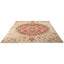 Traditional Oriental rug with intricate floral and geometric patterns.