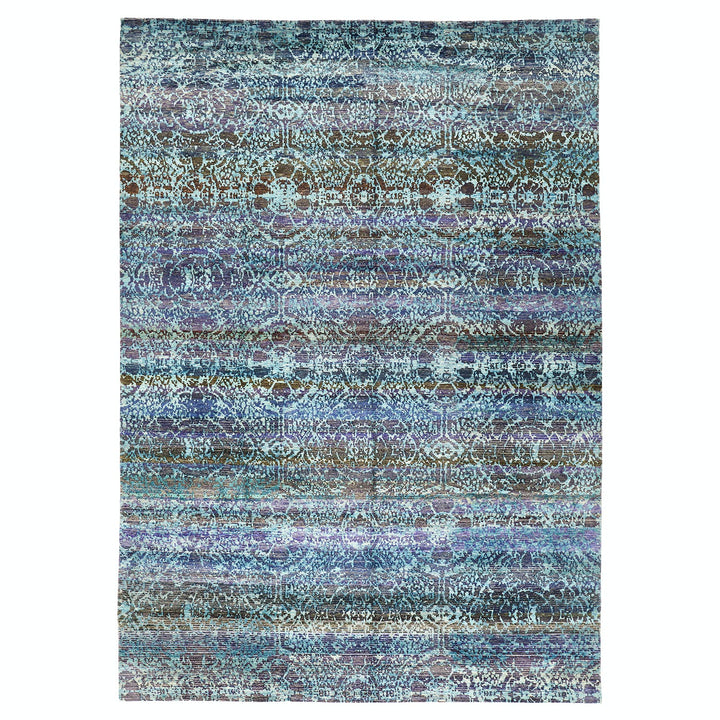 Vintage-style decorative rug with intricate geometric and abstract pattern.