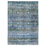 Vintage-style decorative rug with intricate geometric and abstract pattern.