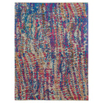 Vibrant, multicolored abstract rug adds artistic flair to any space.