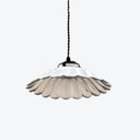 Vintage pendant light with unique fluted design, perfect for interiors.