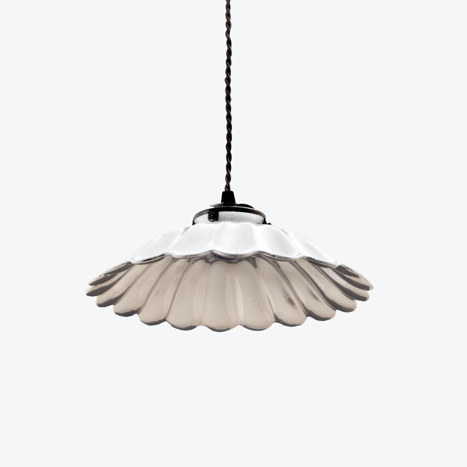 Vintage pendant light with unique fluted design, perfect for interiors.