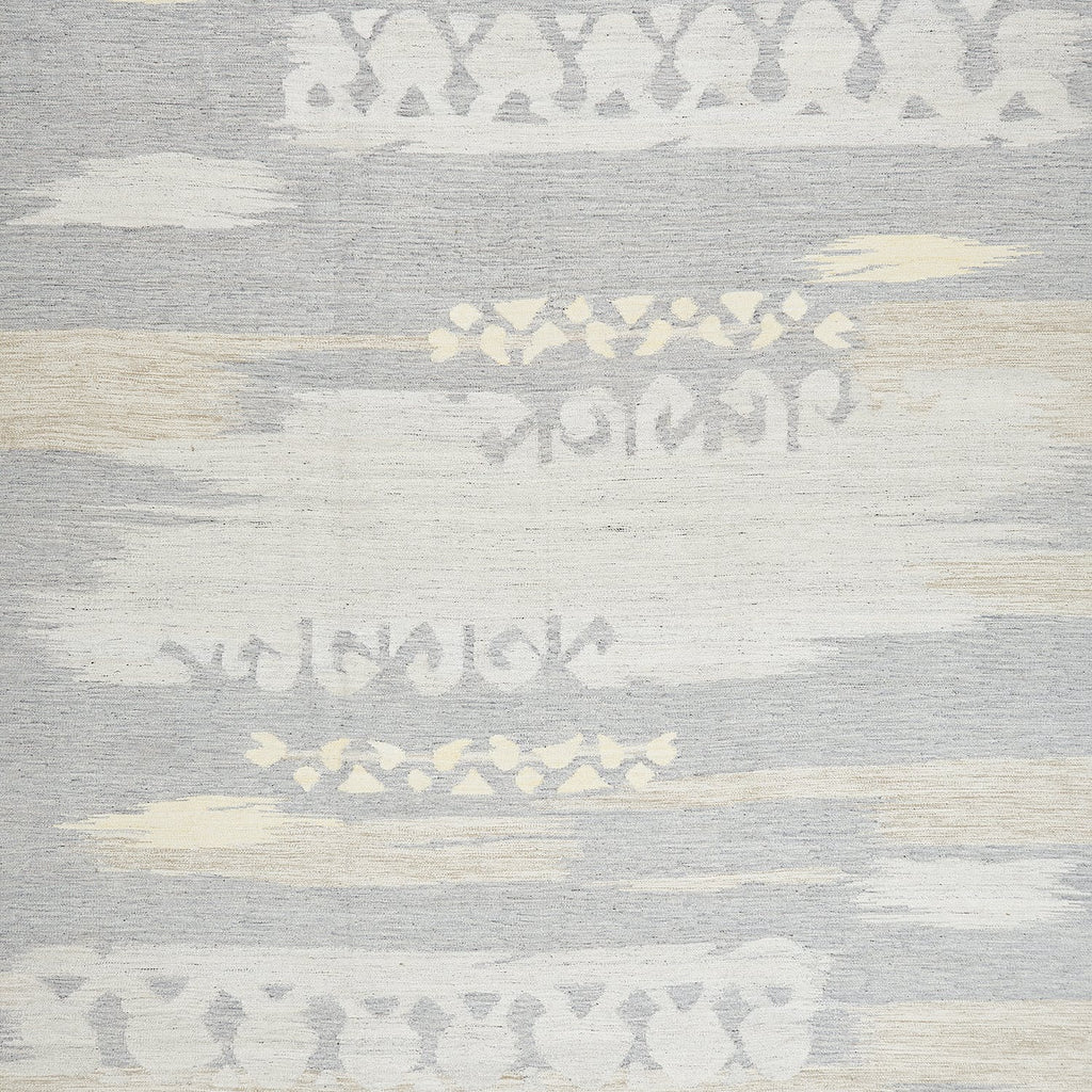 Textile with versatile tribal-inspired design featuring abstract geometric shapes.
