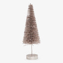 Modern tabletop Christmas tree with glittery finish on white background.