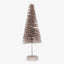 Sparkly Christmas tree decoration with glittery finish on white background.