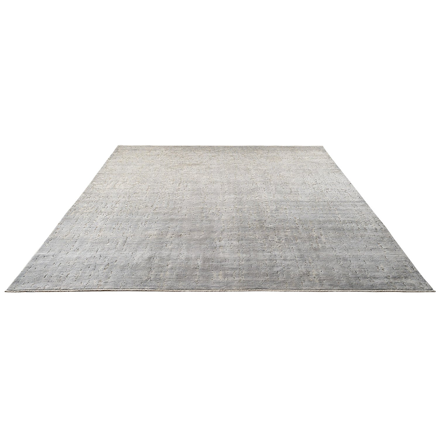 Contemporary rectangular carpet with faded pattern and subtle texture.