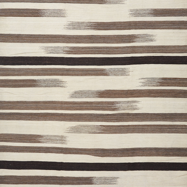 Abstract organic pattern with neutral tones for versatile interiors.
