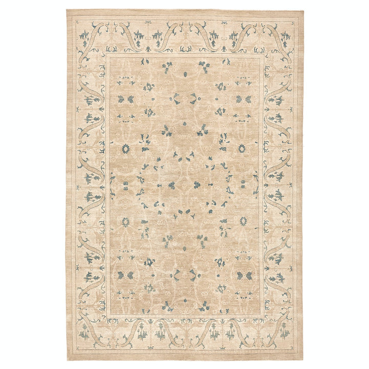 Neutral rectangular area rug with floral motifs in light blue
