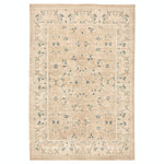 Neutral rectangular area rug with floral motifs in light blue