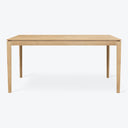 Minimalist wooden table with clean lines and light finish