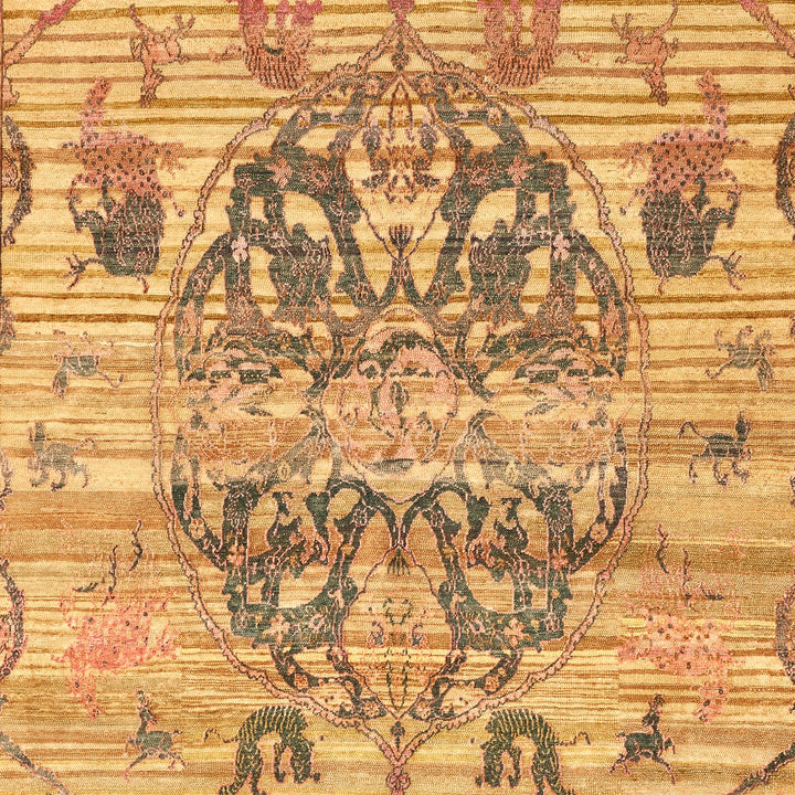 Intricately designed antique rug featuring symmetrical geometric and floral motifs.