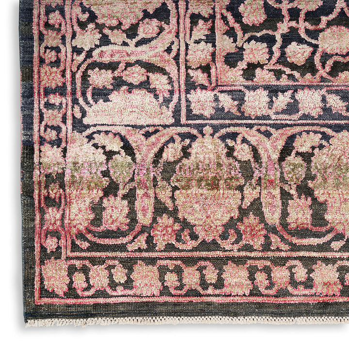 Intricately designed, plush handcrafted rug with floral motifs and border.