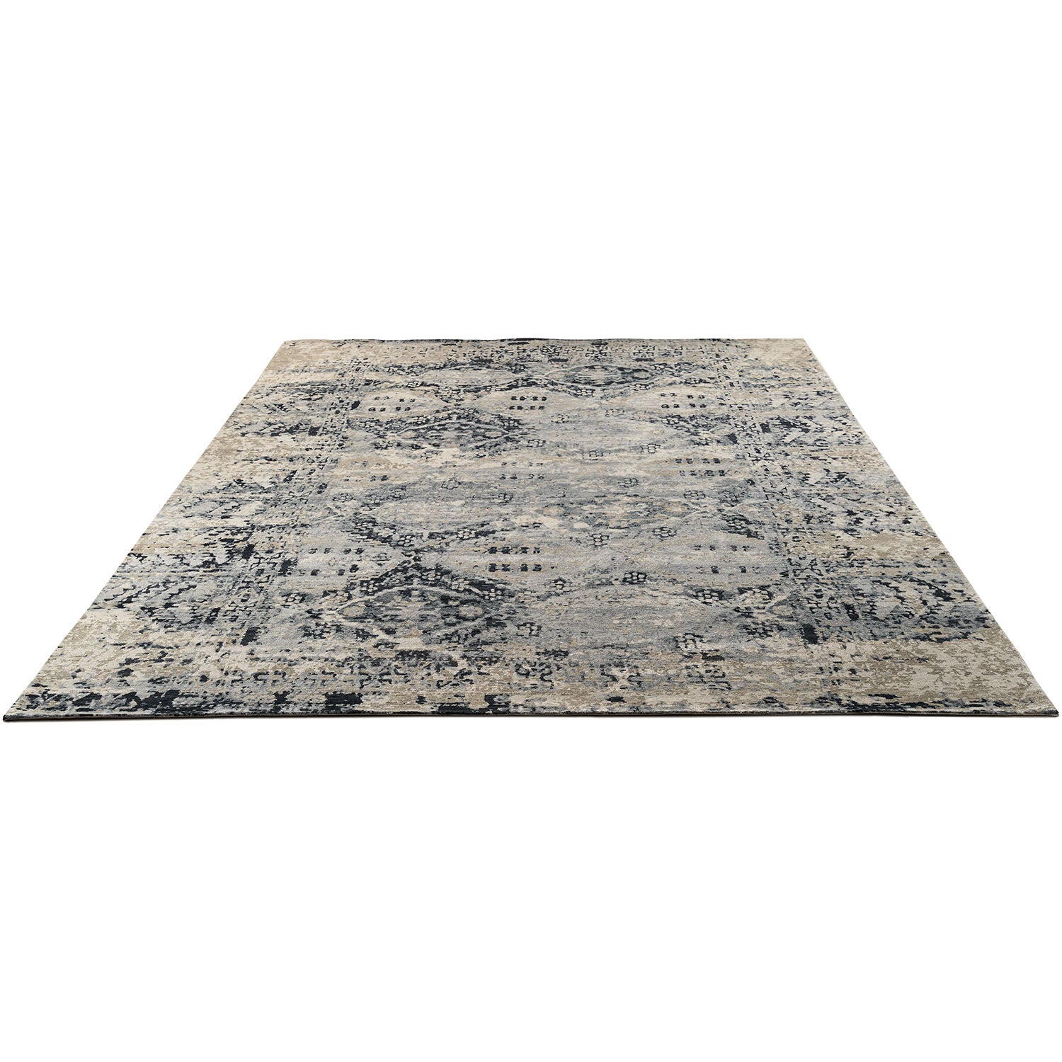 Vintage-inspired rectangular area rug with weathered look and traditional motifs.