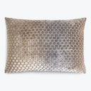 Decorative pillow with gradient circular patterns in velvety texture.
