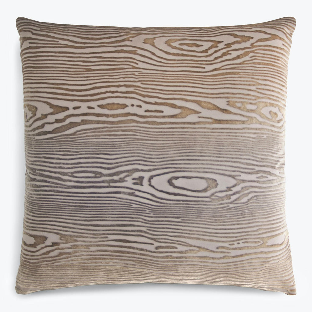 Stylish wood grain pillow with organic pattern enhances rustic decor.