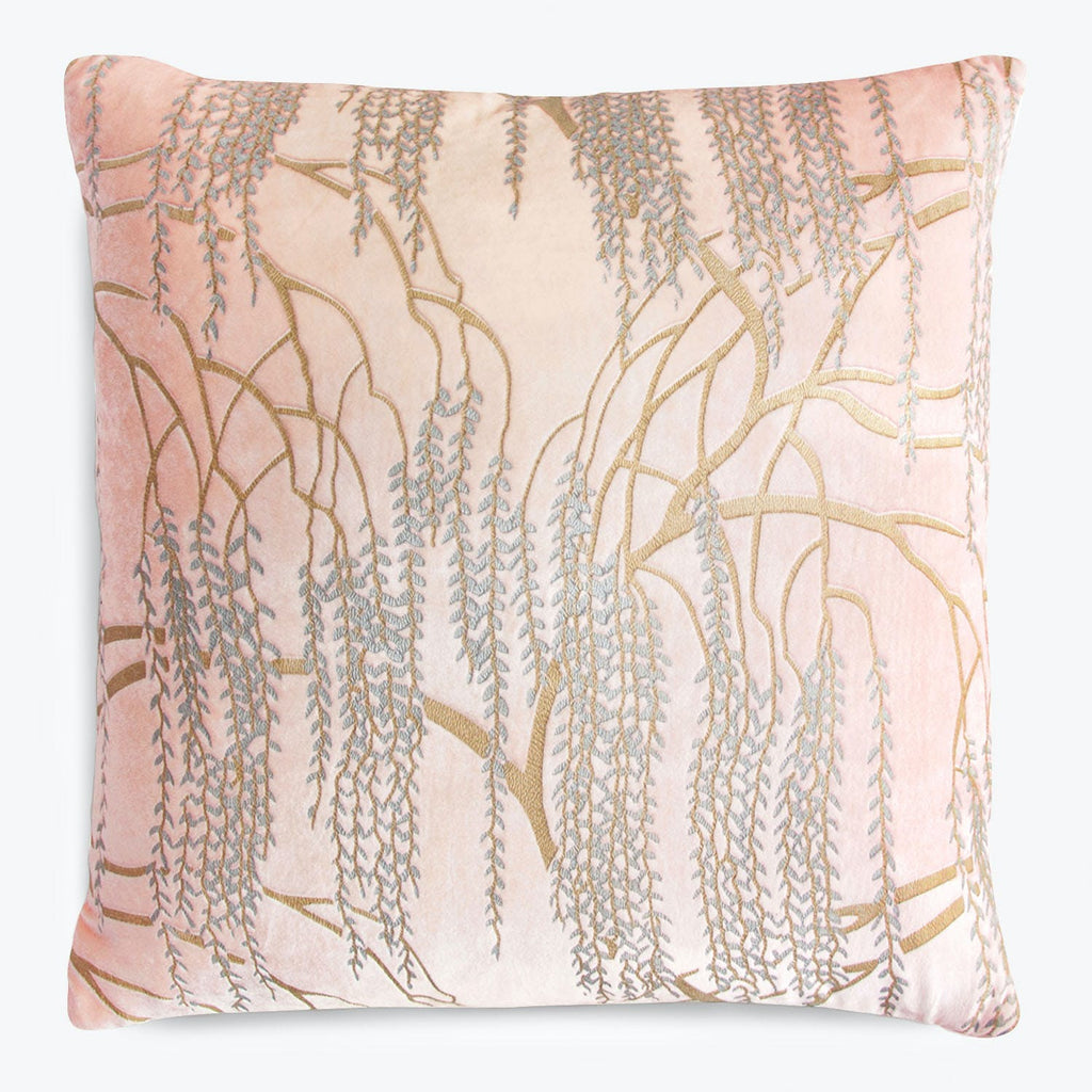 Botanical-inspired decorative pillow with intricate blue and gold willow design