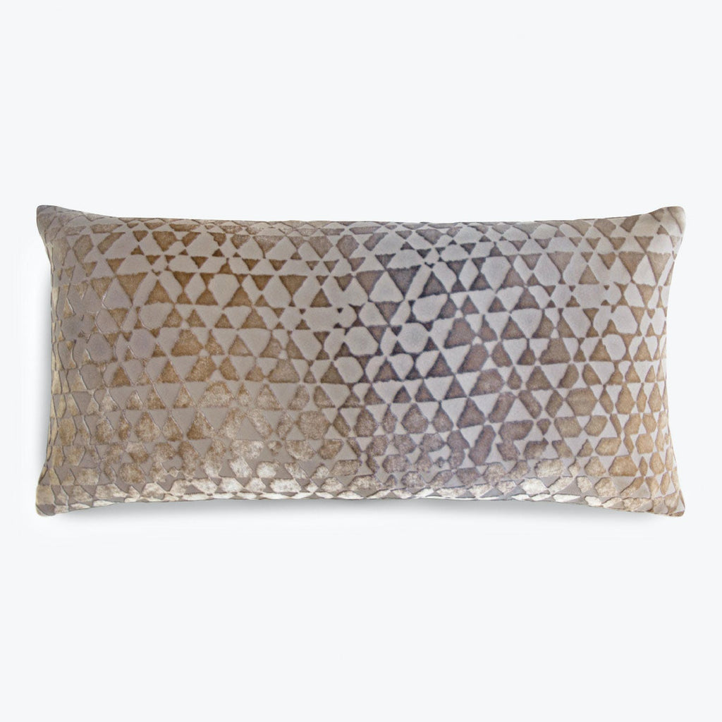 Rectangular pillow with a gradient of triangles in earth tones.