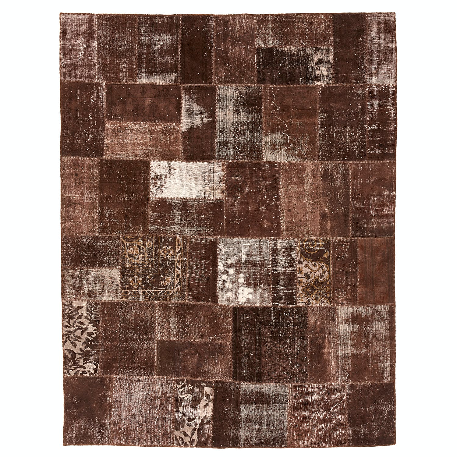 Abstract patchwork rug with rustic charm and contemporary motifs.