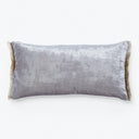 Rectangular decorative pillow with velvet texture and golden fringe trim