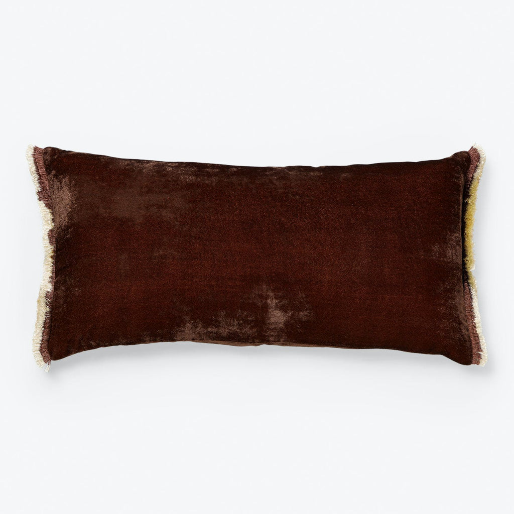 Plush, velvety rectangular pillow in rich dark brown with light trim