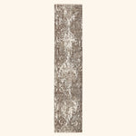 Intricately patterned vintage runner rug in neutral shades adds elegance.