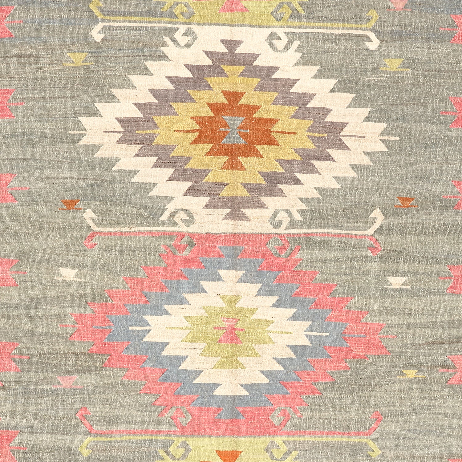 Hand-woven rug showcasing intricate geometric patterns with tribal influences.