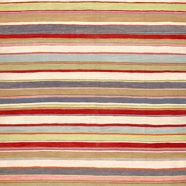 Multi-colored striped pattern with irregular widths creates warm, textured look.