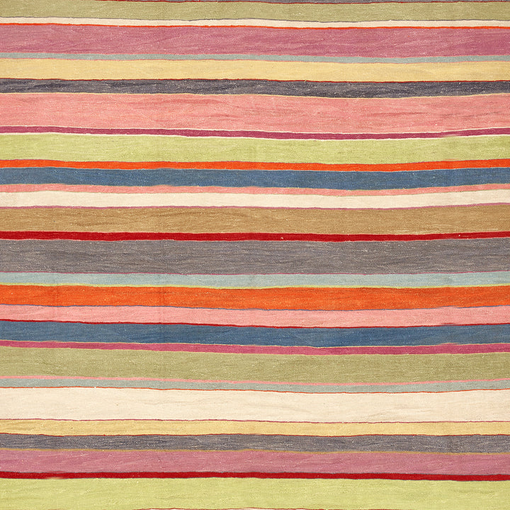 Vibrant, handwoven textile with horizontal stripes in muted earthy tones.