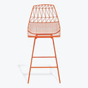 Orange modern bar stool with wireframe design stands out visually.
