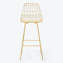 Modern high stool with geometric wireframe design and golden finish.