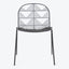 Contemporary wire chair with minimalist design and intricate geometric patterns.