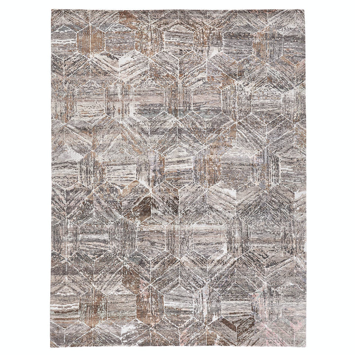 Rectangular rug with geometric pattern in brown and beige tones.