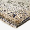 Close-up of a high-quality woven rug with intricate design.