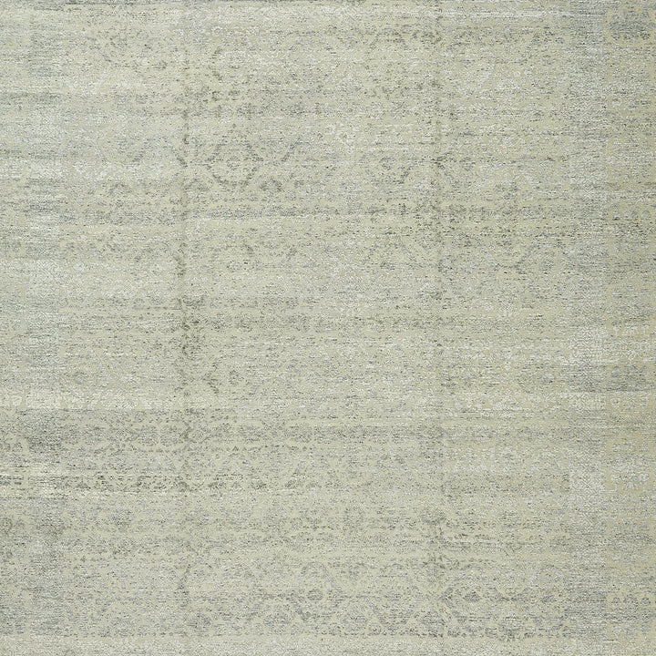 Vintage-inspired fabric with intricate faded pattern in natural tones.