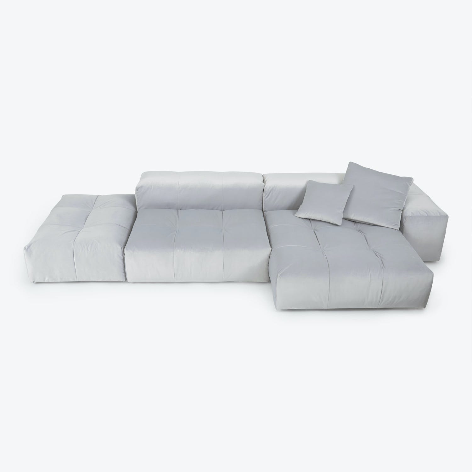 Contemporary modular sectional sofa with versatile design and minimalist aesthetic.