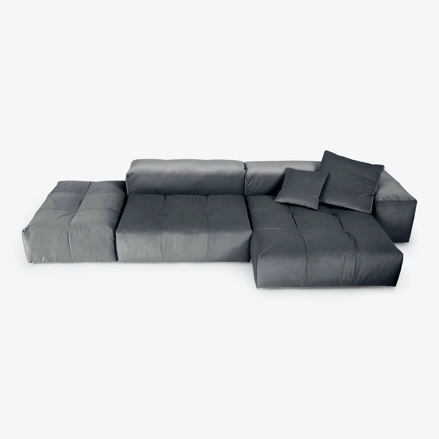 Modern, modular sectional sofa in dark grey offers customizable seating.