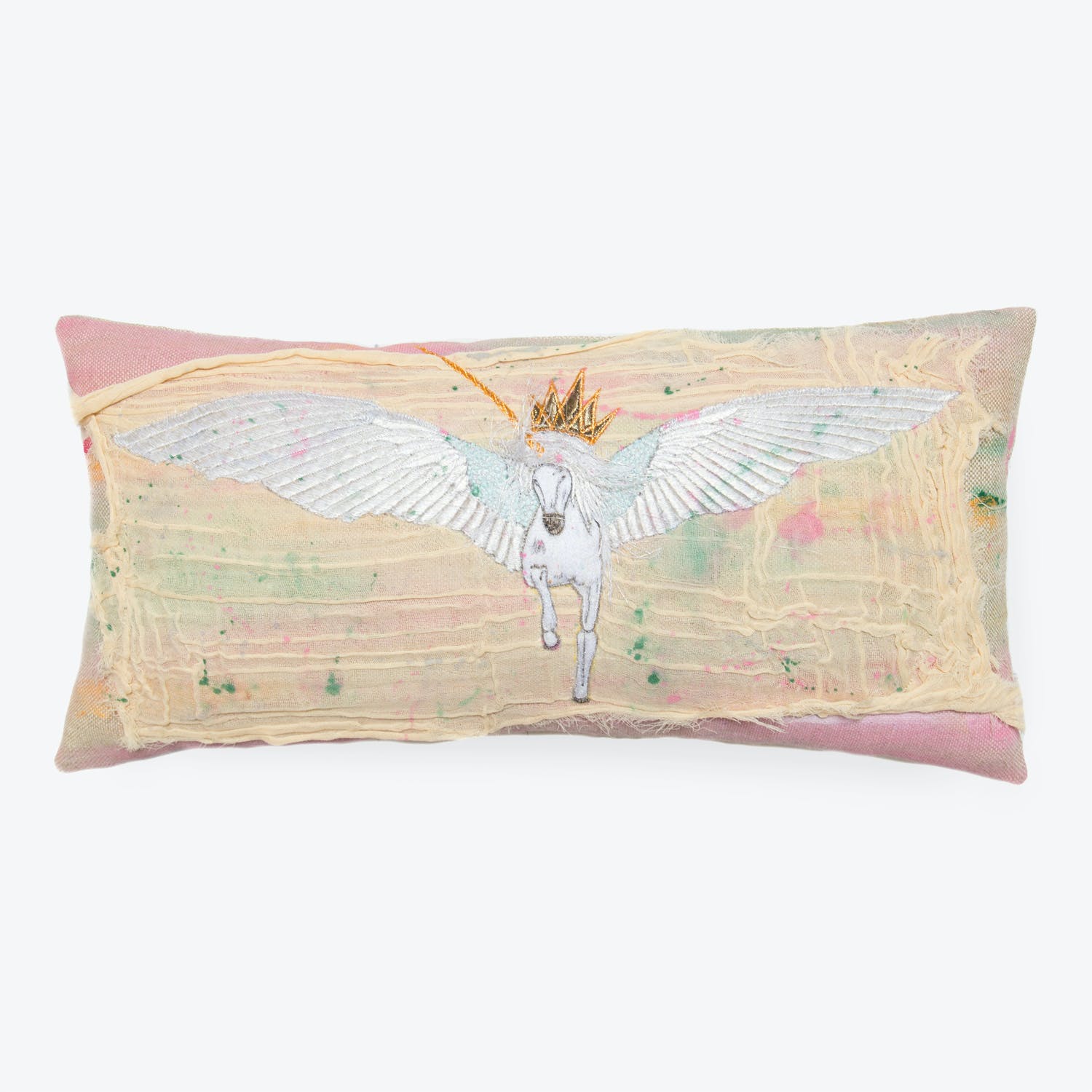 Whimsical unicorn pillow with majestic flying pose and golden crown.