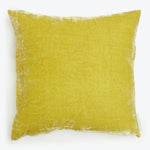 Vibrant yellow square pillow with plush texture and soft fabric.