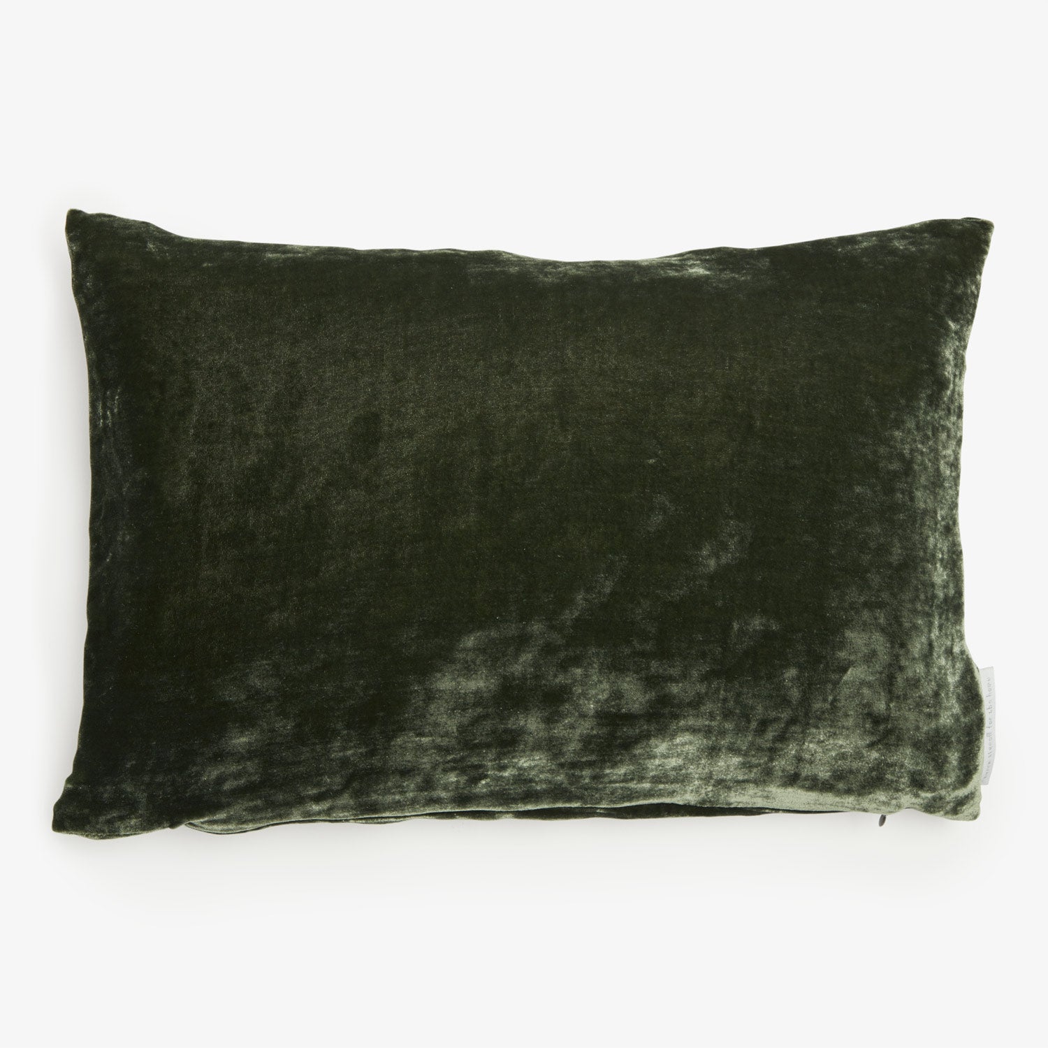 Rectangular dark green velvet pillow with a plush, luxurious texture.