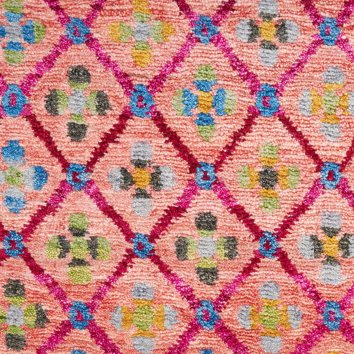 Close-up of a hand-woven textile showcasing vibrant diamond lattice pattern.