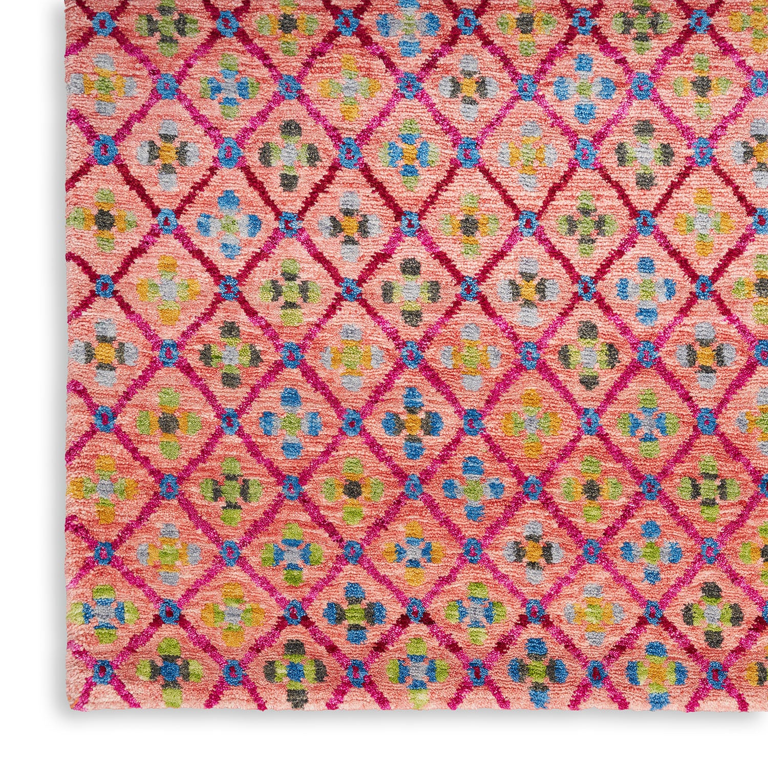 Intricate, vibrant textile featuring a diamond lattice pattern with floral motifs.