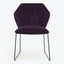 Contemporary elegance embodied in a plum-colored, velvet upholstered hexagonal chair.