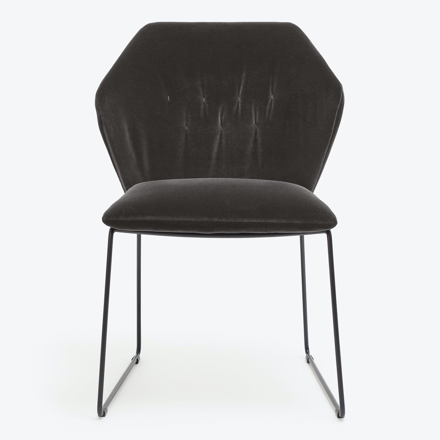 Modern black chair with plush upholstery and sleek metal frame.