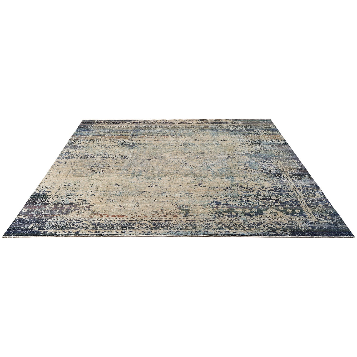 Vintage-style rectangular area rug with intricate faded design and border.