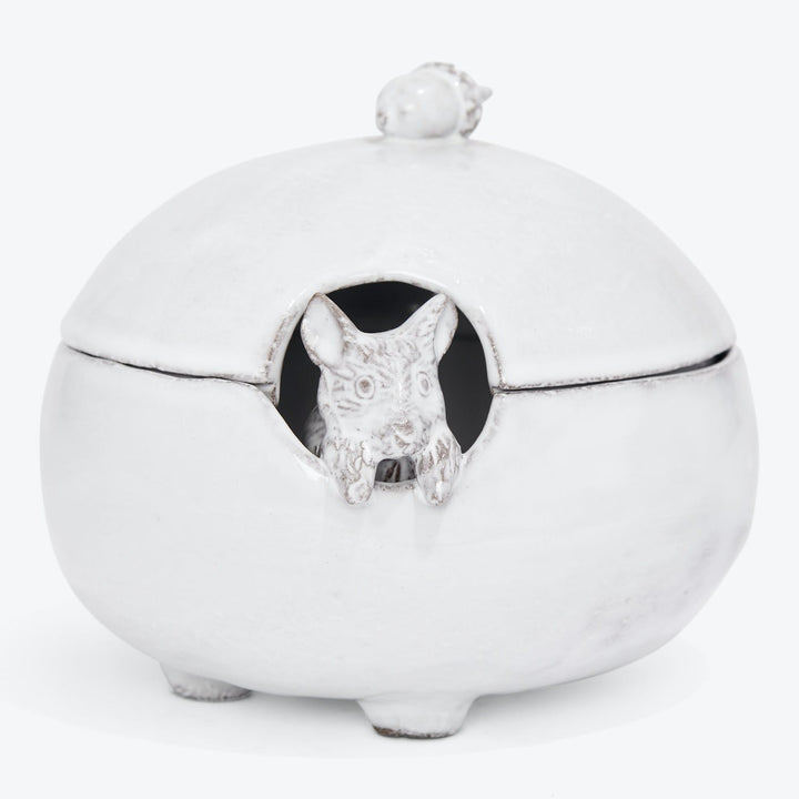 Whimsical ceramic jar with owl peeking out, perfect home decor.