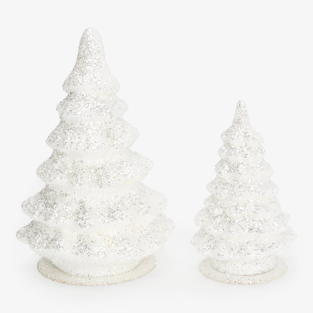 Two white glitter Christmas trees, one large and one small.