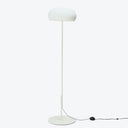 Modern minimalist floor lamp with sleek white design and oval shade.